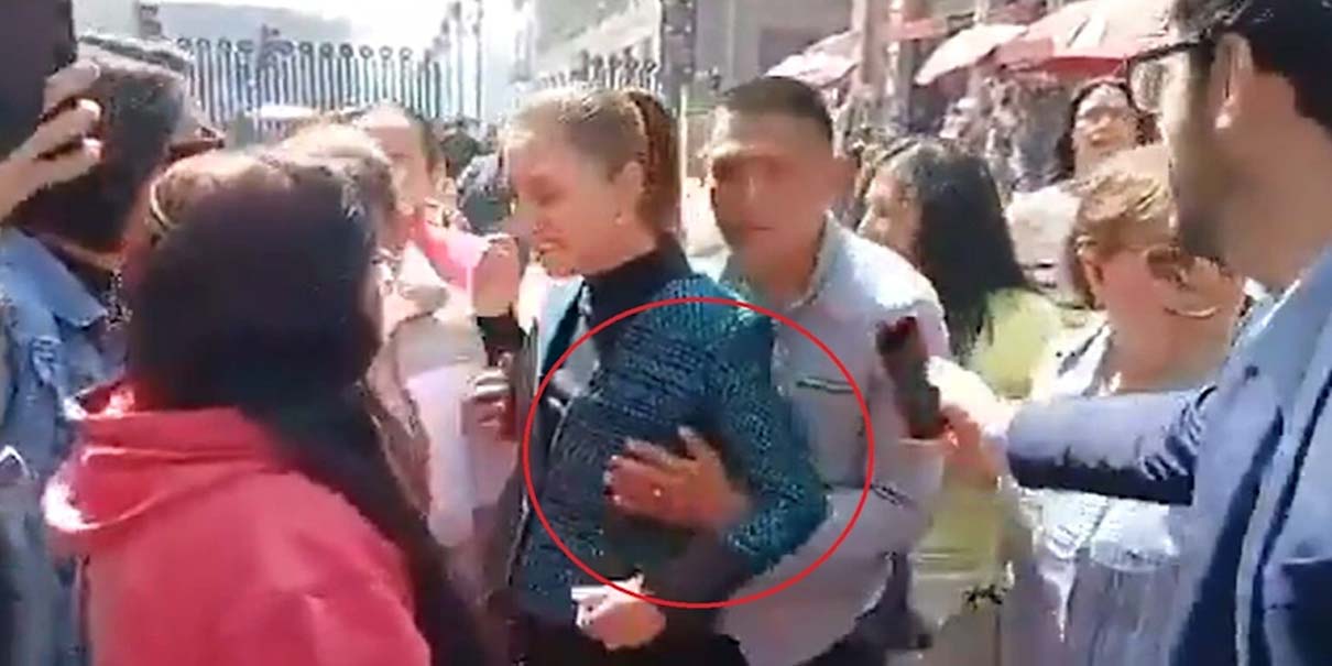 Un tipo toquetea y acosa a la Presidenta Claudia Sheinbaum afuera de Palacio Nacional; ya fue detenido