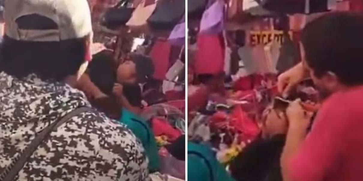 Así raparon a dos presuntas farderas en un mercado de Puebla; comerciantes las rodean