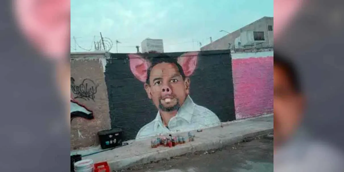 Detienen a muralistas en Ciudad Juárez por pintar al alcalde como cerdo