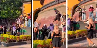 VIDEO. Fotógrafo patea a manifestante durante marcha del 8M en Querétaro y desata polémica en redes sociales